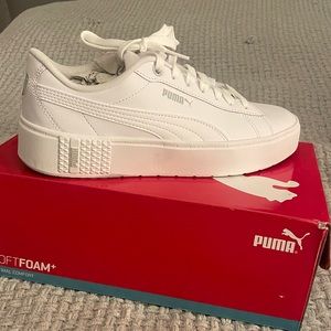 Brand new all white Puma . Never worn